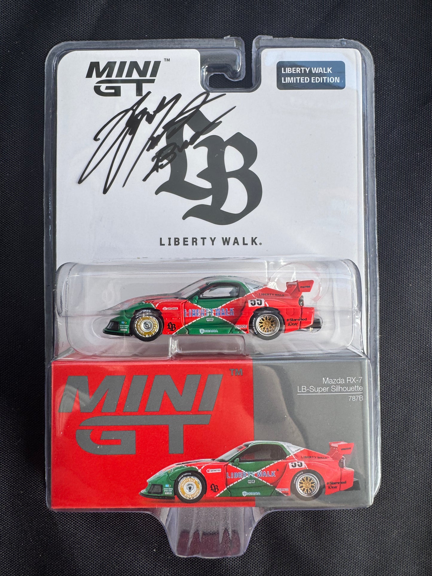 (Preorder) Mini GT 1:64 Mazda RX-7 LB-Super Silhouette 787B Store Exclusive Signed by Hyuma