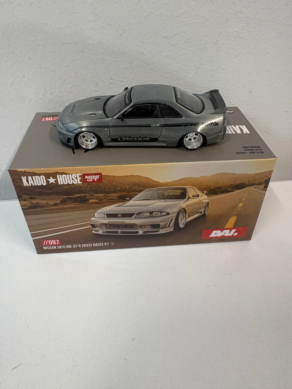 Kaido House x Mini GT 1:64 Nissan Skyline GT-R (R33) DAI33 V1- Chase Car