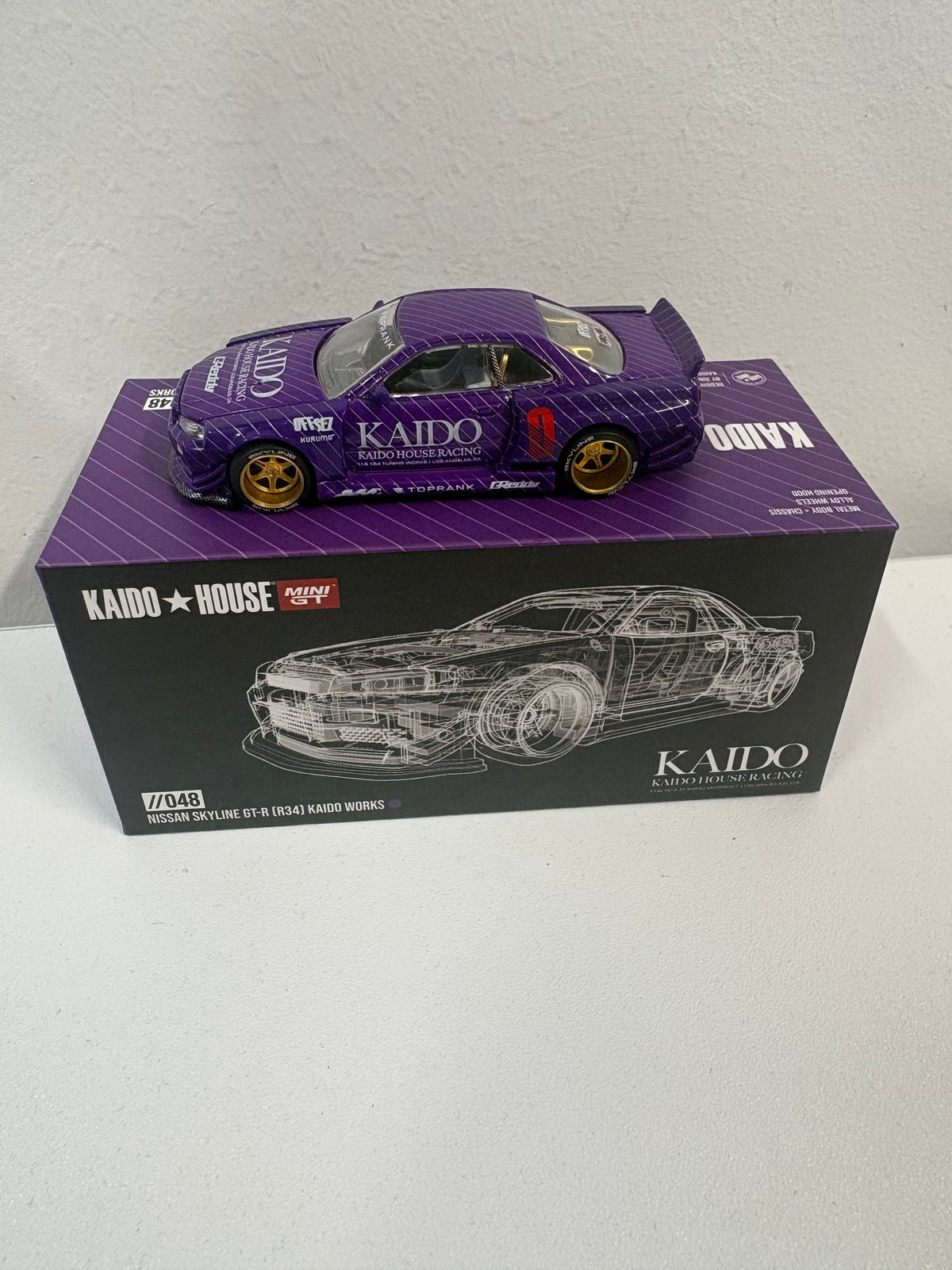 Kaido House x Mini GT 1:64 Nissan Skyline GT-R (R34) Kaido Works- Chase Car