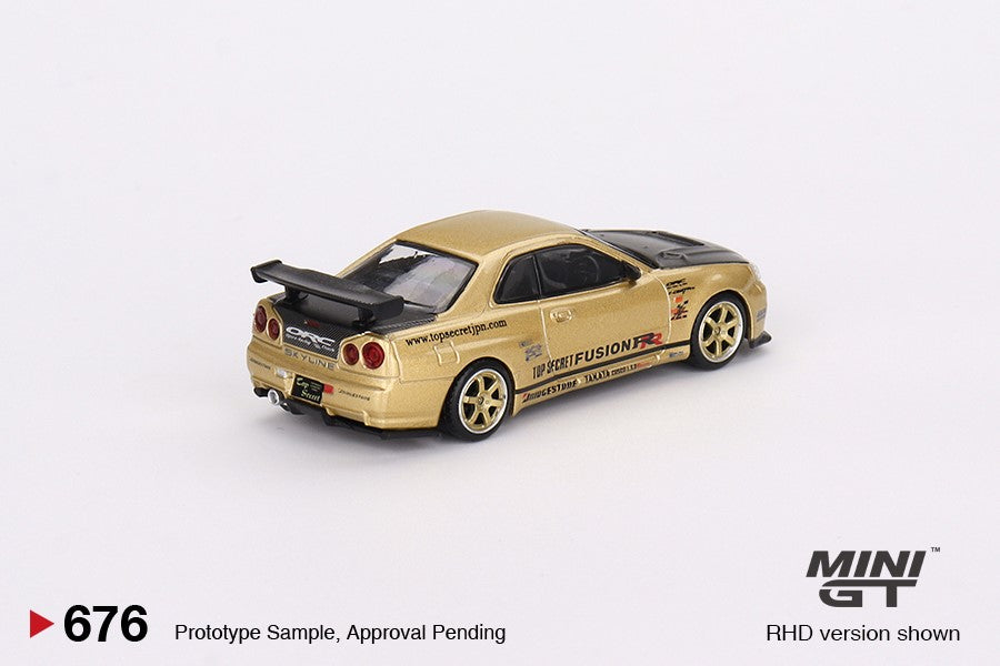 (Preorder) Mini GT Nissan Skyline GT-R (R34) Top Secret Top Secret Gold - Japan Exclusive (NOT USA BLISTER PACK)